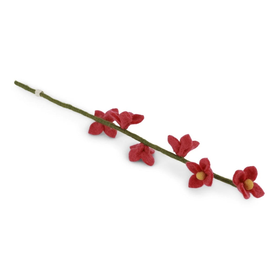 Fel roze bloemen op tak