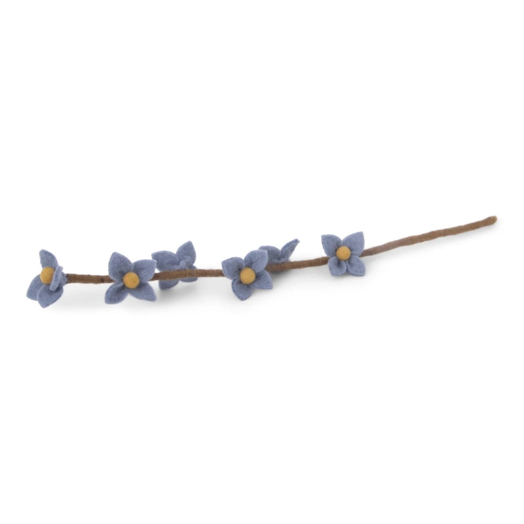 Blauwe bloemen op tak